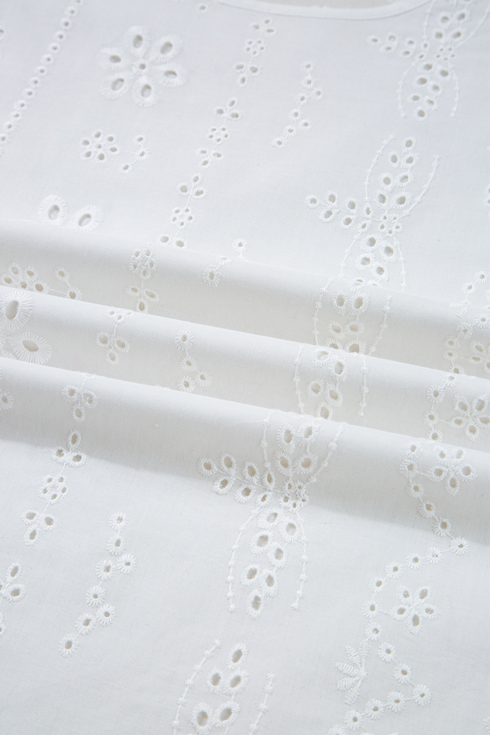 White Eyelet Embroidered Smocked Cuff Sheer Blouse